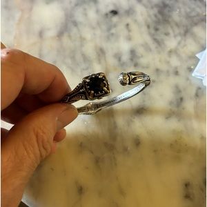 Sterling Silver with Black Onyx hinged cuff.